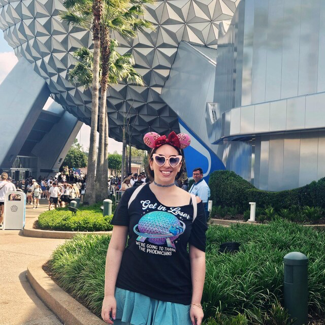 Ever After Society customer styling a black graphic tee with a blue skirt on vacation